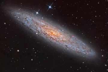 تصویر روز ناسا: NGC 253 کهکشان غبارآلود